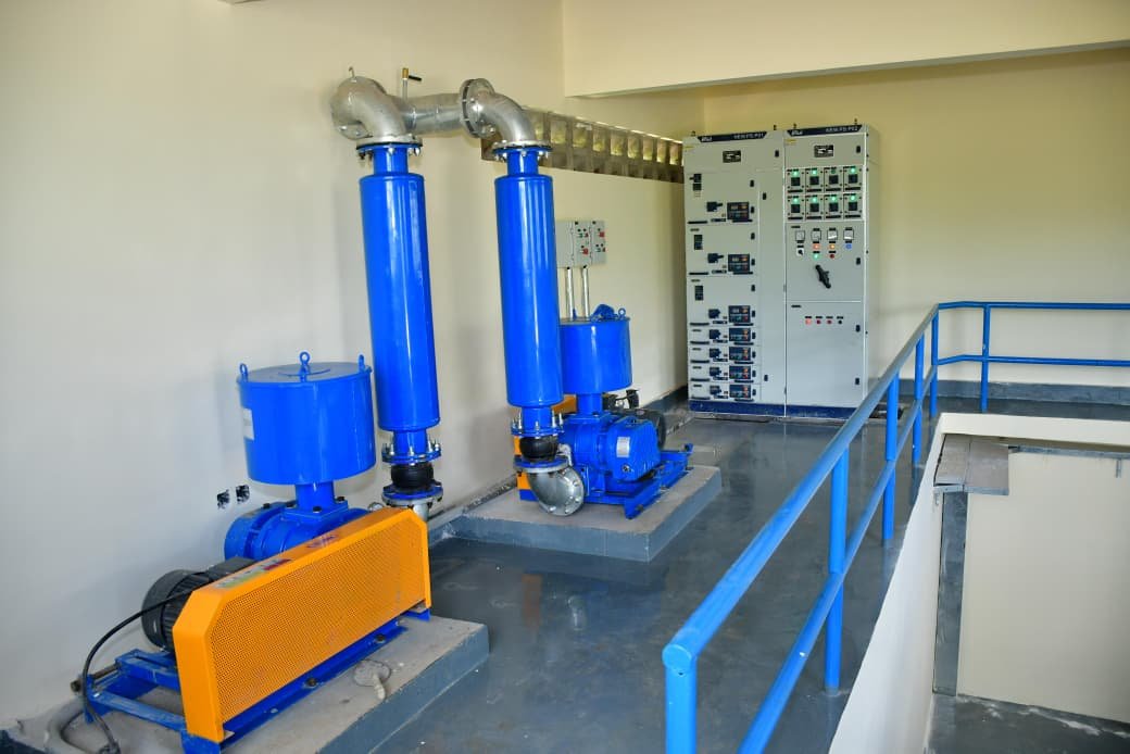 Aqua-Flow engineers reviewing infrastructure plans on site